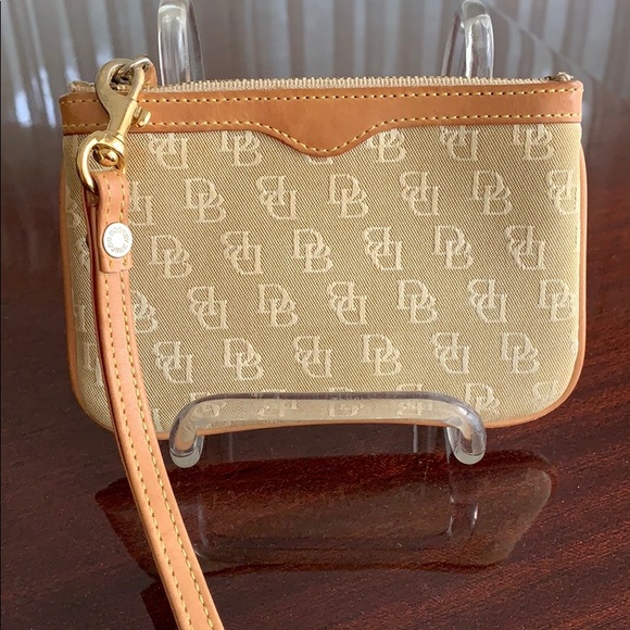 Dooney & Bourke Handbags - Pre-loved Dooney & Bourke Nude Wristlet